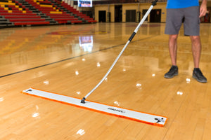This is the procourt gym floor dust mop with this system you will have better traction and a less slippery gym
